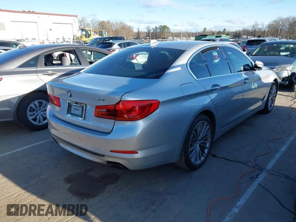 2019 BMW 5 Series 540i with VIN WBAJE5C58KWE66057, listed as a IAAI auction lot 41721886 with 119,712 mi miles and . Bid and sale history available at DreamBid. Image 4.