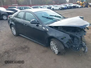 2013 Cadillac CTS Luxury z VIN 1G6DG5E56D0165283, wystawiony jako IAAI lot #42099397 z przebiegiem 148 279 mil mil oraz . Historia ofert i sprzedaży dostępna na DreamBid. Obrazek 1.