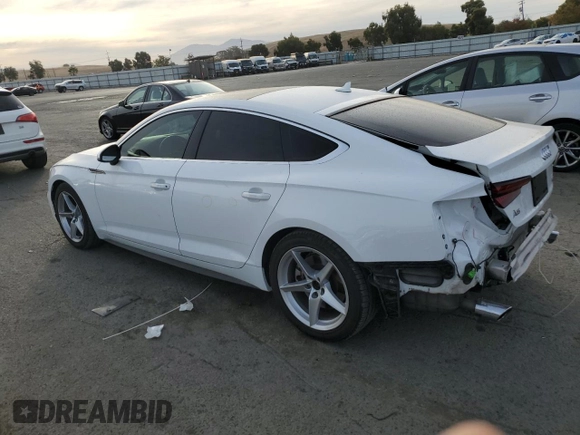 2018 Audi A5 Sportback Premium with VIN WAUDNCF51JA080277, listed as a Copart auction lot 77560844 with 139,696 mi miles and Salvage Title. Bid and sale history available at carsss.com. Image 2.