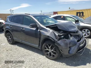 2016 Toyota RAV4 SE with VIN JTMNFREV2GJ072643, listed as a Copart auction lot 63879695 with 104,118 mi miles and Salvage title. Bid and sale history available at DreamBid. Image 4.