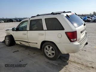 2009 Jeep Grand Cherokee Laredo with VIN 1J8HR48P89C532571, listed as a Copart auction lot 57309544 with 203,423 mi miles and Non Repairable. Bid and sale history available at carsss.com. Image 2.