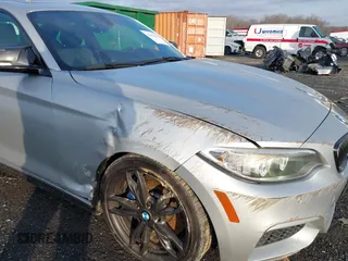 2016 BMW 2 Series M235i with VIN WBA1J7C54GV359301, listed as a IAAI auction lot 41186271 with 97,671 mi miles. Bid and sale history available at carsss.com. Image 6.