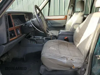 1996 Jeep Cherokee Country with VIN 1J4FJ78S9TL252803, listed as a Copart auction lot 49278184 with 180,420 mi miles and Clean Title. Bid and sale history available at carsss.com. Image 7.