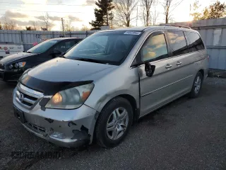2005 Honda Odyssey TOURING with VIN 5FNRL388X5B503473, listed as a Copart auction lot 84822944 with 247,028 mi miles and Clean Title. Bid and sale history available at carsss.com. Image 1.