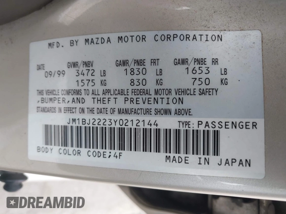 2000 Mazda Protege DX with VIN JM1BJ2223Y0212144, listed as a IAAI auction lot 41570436 with 221,430 mi miles and . Bid and sale history available at DreamBid. Image 9.