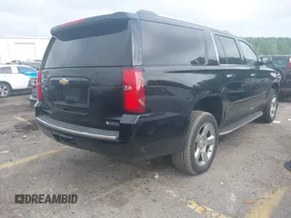 2018 Chevrolet Suburban Premier with VIN 1GNSCJKC9JR100504, listed as a IAAI auction lot 42276280 with 153,916 mi miles and . Bid and sale history available at DreamBid. Image 4.