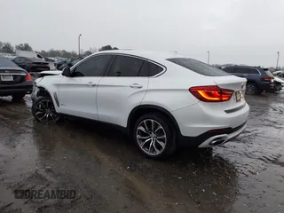 2018 BMW X6 xDrive35i with VIN 5UXKU2C52J0Z62462, listed as a IAAI auction lot 41719720 with 61,522 mi miles. Bid and sale history available at carsss.com. Image 3.