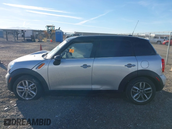 2012 MINI Countryman with VIN WMWZB3C59CWM05749, listed as a IAAI auction lot 38329304 with 64,590 mi miles and . Bid and sale history available at DreamBid. Image 14.