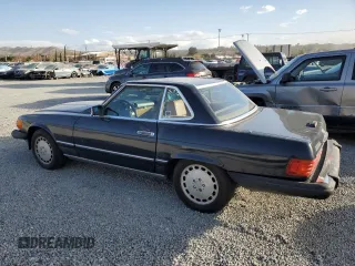 1988 Mercedes-Benz 560 SL with VIN WDBBA48D3JA075404, listed as a Copart auction lot 87551575 with 154,527 mi miles and Clean Title. Bid and sale history available at carsss.com. Image 2.