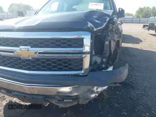 2015 Chevrolet Silverado 1500 LS with VIN 1GCRCPEC3FZ211837, listed as a IAAI auction lot 41986424 with 107,740 mi miles and . Bid and sale history available at DreamBid. Image 17.