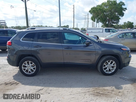 2016 Jeep Cherokee Latitude z VIN 1C4PJMCS1GW367447, wystawiony jako IAAI lot #42367643 z przebiegiem 151 072 mil mil oraz . Historia ofert i sprzedaży dostępna na DreamBid. Obrazek 13.