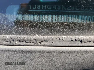 2009 Jeep Commander Sport с VIN 1J8HG48K29C529532, выставлен на аукционе Copart как лот 47182315 с пробегом 175 857 миль миль и Списание • Salvage title. История ставок и продаж доступна на DreamBid. Изображение 13.