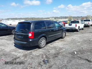 2015 Chrysler Town & Country Touring with VIN 2C4RC1BG5FR521339, listed as a IAAI auction lot 41984089 with 107,275 mi miles and . Bid and sale history available at DreamBid. Image 4.