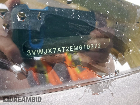 2014 Volkswagen Beetle 2.5L with VIN 3VWJX7AT2EM610372, listed as a Copart auction lot 60163345 with 121,497 mi miles and Salvage title. Bid and sale history available at DreamBid. Image 12.