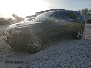 2012 Jeep Grand Cherokee SRT8 with VIN 1C4RJFDJ2CC265421, listed as a Copart auction lot 48654325 with 115,514 mi miles and Salvage Title. Bid and sale history available at carsss.com. Image 1.
