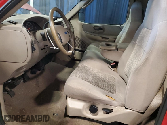 2003 Ford F-150 XL with VIN 1FTRF17W03NB26338, listed as a Copart auction lot 82484904 with 163,992 mi miles and Salvage Title. Bid and sale history available at DreamBid. Image 7.
