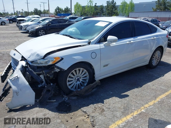 2016 Ford Fusion Energi SE Luxury with VIN 3FA6P0PU7GR206589, listed as a IAAI auction lot 42002565 with 215,789 mi miles. Bid and sale history available at carsss.com. Image 2.