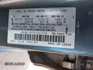 2012 Mazda 3 i Touring with VIN JM1BL1V77C1611119, listed as a IAAI auction lot 42177506 with 91,970 mi miles and . Bid and sale history available at DreamBid. Image 9.