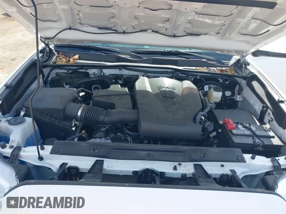 2023 Toyota Tacoma SR with VIN 3TMCZ5AN2PM642205, listed as a IAAI auction lot 42167945 with 10,595 mi miles and . Bid and sale history available at DreamBid. Image 10.