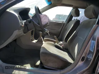 1999 Toyota Corolla VE with VIN 1NXBR12E9XZ158252, listed as a Copart auction lot 58757595 with 232,776 mi miles and Salvage title. Bid and sale history available at DreamBid. Image 7.