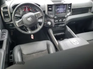 2020 Ram 1500 Rebel with VIN 1C6SRFLT5LN408810, listed as a Copart auction lot 56894725 with 49,089 mi miles and Salvage title. Bid and sale history available at DreamBid. Image 8.