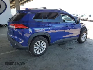2022 Toyota Corolla Cross LE with VIN 7MUCAAAG6NV021103, listed as a Copart auction lot 56882015 with 21,769 mi miles and Salvage title. Bid and sale history available at DreamBid. Image 3.