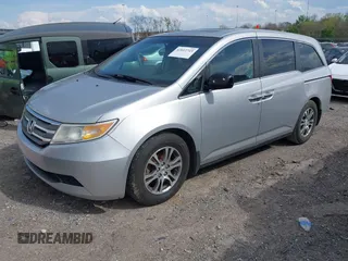 2012 Honda Odyssey EX-L with VIN 5FNRL5H68CB131431, listed as a IAAI auction lot 42012749 with 245,649 mi miles and . Bid and sale history available at carsss.com. Image 2.