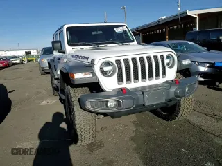 2020 Jeep Wrangler Unlimited Rubicon z VIN 1C4HJXFN1LW335751, wystawiony jako Copart lot #54242215 z przebiegiem 74 961 mil mil oraz Szkoda całkowita • Salvage title. Historia ofert i sprzedaży dostępna na DreamBid. Obrazek 11.