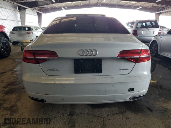 2017 Audi A8 with VIN WAU44AFD2HN009512, listed as a Copart auction lot 84442474 with 44,174 mi miles and Salvage title. Bid and sale history available at DreamBid. Image 6.