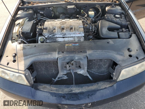 2002 Cadillac Seville Touring STS z VIN 1G6KY54922U210928, wystawiony jako Copart lot #71214564 z przebiegiem Nie podano mil oraz Czysty tytuł • Clean title. Historia ofert i sprzedaży dostępna na DreamBid. Obrazek 11.