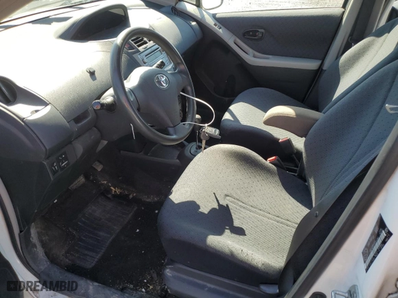 2009 Toyota Yaris with VIN JTDKT923395254782, listed as a Copart auction lot 49500505 with 164,957 mi miles and Salvage Title. Bid and sale history available at carsss.com. Image 7.