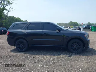 2015 Dodge Durango Limited with VIN 1C4RDJDG6FC917301, listed as a IAAI auction lot 42559104 with 263,499 mi miles and . Bid and sale history available at DreamBid. Image 13.