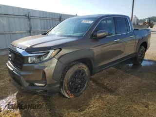 2022 Honda Ridgeline RTL-E z VIN 5FPYK3F79NB037874, wystawiony jako Copart lot #65616285 z przebiegiem 39 856 mil mil oraz Czysty tytuł • Clean title. Historia ofert i sprzedaży dostępna na DreamBid. Obrazek 1.