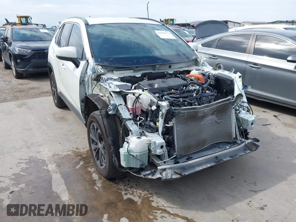 2022 Toyota RAV4 Hybrid SE with VIN 4T3T6RFV4NU065150, listed as a IAAI auction lot 42166772 with 69,868 mi miles and . Bid and sale history available at DreamBid. Image 1.