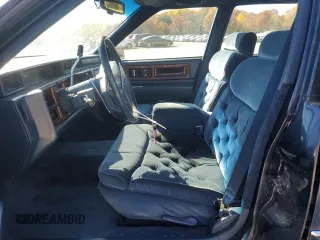 1992 Cadillac Fleetwood z VIN 1G6CB53B4N4301200, wystawiony jako Copart lot #71384554 z przebiegiem 115 430 mil mil oraz Tytuł czysty. Historia ofert i sprzedaży dostępna na DreamBid. Obrazek 7.