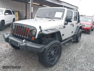 2007 Jeep Wrangler Unlimited X with VIN 1J4GA39197L123209, listed as a IAAI auction lot 41574128 with 311,844 mi miles. Bid and sale history available at carsss.com. Image 17.
