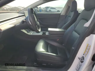 2021 Tesla Model 3 Standard Range Plus with VIN 5YJ3E1EA2MF923156, listed as a Copart auction lot 50098135 with 50,917 mi miles and Salvage Title. Bid and sale history available at carsss.com. Image 7.