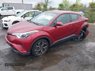 2019 Toyota C-HR XLE with VIN NMTKHMBX0KR088761, listed as a IAAI auction lot 42037328 with 28,501 mi miles and . Bid and sale history available at DreamBid. Image 2.