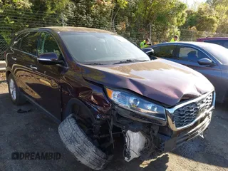 2019 Kia Sorento LX z VIN 5XYPG4A56KG481297, wystawiony jako IAAI lot #41994392 z przebiegiem 147 688 mil mil oraz . Historia ofert i sprzedaży dostępna na DreamBid. Obrazek 1.