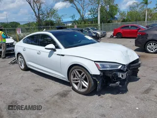 2019 Audi A5 Sportback Premium z VIN WAUANCF56KA080411, wystawiony jako IAAI lot #42208539 z przebiegiem 131 690 mil mil oraz . Historia ofert i sprzedaży dostępna na DreamBid. Obrazek 1.