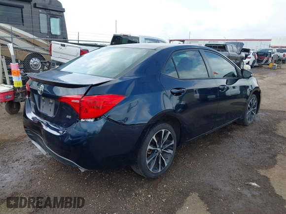 2017 Toyota Corolla L with VIN 5YFBURHE5HP685616, listed as a IAAI auction lot 42388072 with 144,356 mi miles and . Bid and sale history available at DreamBid. Image 4.