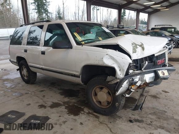 1998 GMC Yukon with VIN 1GKEK13R7WJ700881, listed as a IAAI auction lot 41507538 with 188,396 mi miles. Bid and sale history available at carsss.com. Image 1.