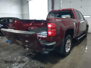 2015 Chevrolet Silverado 1500 LT with VIN 1GCVKREC1FZ184196, listed as a IAAI auction lot 41246741 with 108,028 mi miles and . Bid and sale history available at DreamBid. Image 4.