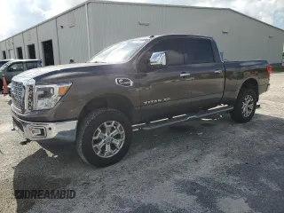 2016 Nissan Titan XD Platinum Reserve with VIN 1N6BA1F20GN500500, listed as a Copart auction lot 75396354 with 164,966 mi miles and Salvage Title. Bid and sale history available at carsss.com. Image 1.