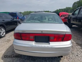 2004 Buick Regal LS z VIN 2G4WB52K541155486, wystawiony jako IAAI lot #42211775 z przebiegiem 96 969 mil mil oraz . Historia ofert i sprzedaży dostępna na DreamBid. Obrazek 16.