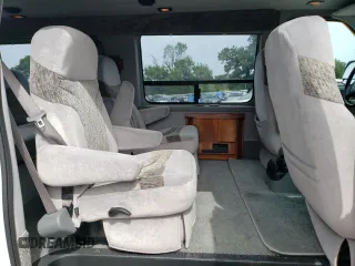 2006 Ford Econoline Cargo Recreational with VIN 1FDRE14W46HA12025, listed as a Copart auction lot 68670614 with 117,301 mi miles and Salvage title. Bid and sale history available at DreamBid. Image 11.