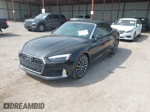 2020 Audi A5 Cabriolet Premium z VIN WAUWNGF50LN000334, wystawiony jako IAAI lot #41919556 z przebiegiem 56 494 mil mil oraz . Historia ofert i sprzedaży dostępna na DreamBid. Obrazek 17.