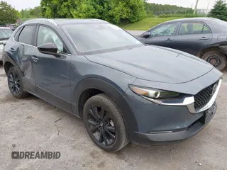 2024 Mazda CX-30 S Carbon Edition z VIN 3MVDMBCM8RM642071, wystawiony jako IAAI lot #42475589 z przebiegiem 10 959 mil mil oraz . Historia ofert i sprzedaży dostępna na DreamBid. Obrazek 1.