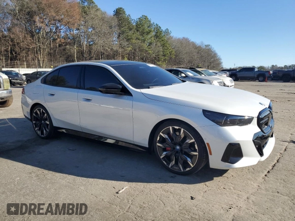 2024 BMW i5 M60 with VIN WBY43FK00RCP86174, listed as a Copart auction lot 45522685 with 7,392 mi miles and Salvage title. Bid and sale history available at DreamBid. Image 4.