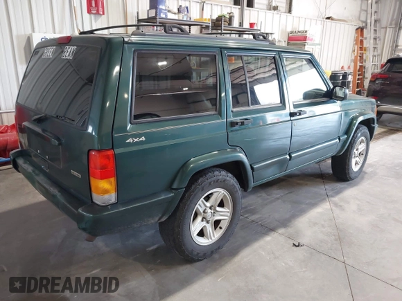 2001 Jeep Cherokee Sport with VIN 1J4FF58S51L579766, listed as a IAAI auction lot 42623211 with 257,681 mi miles and . Bid and sale history available at DreamBid. Image 4.